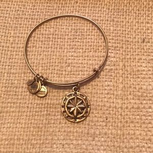 New, gold, compass charm bracelet. Alex and Ani